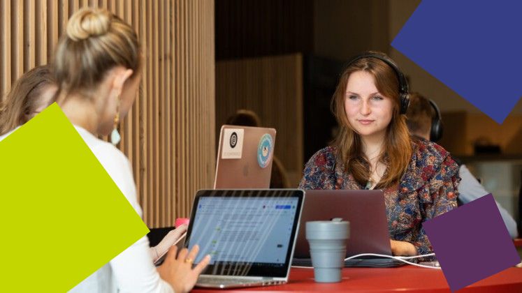 students with laptops, headphones