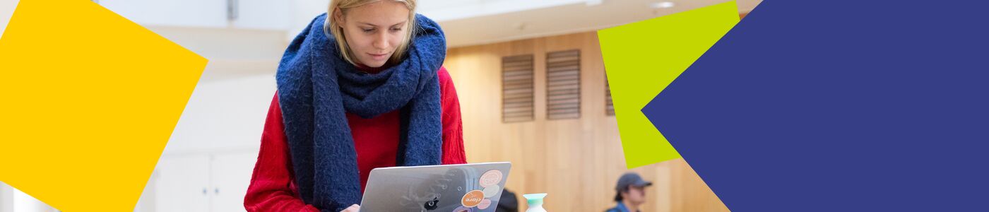 female-student-studying-laptop-scarf-EGI-header-1400x300