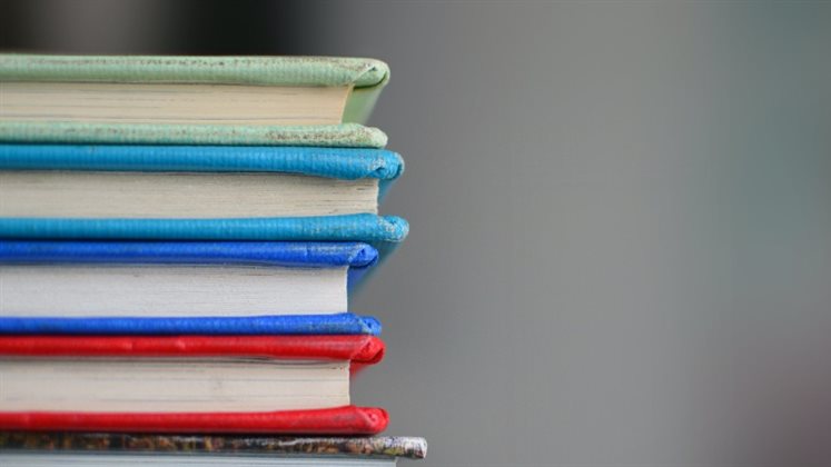 Books stacked on top of each other