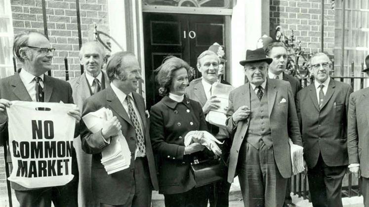 A group of political figures in the 1970s posing outside 10 Downing Street prior to delivering a petition against the Common Market.