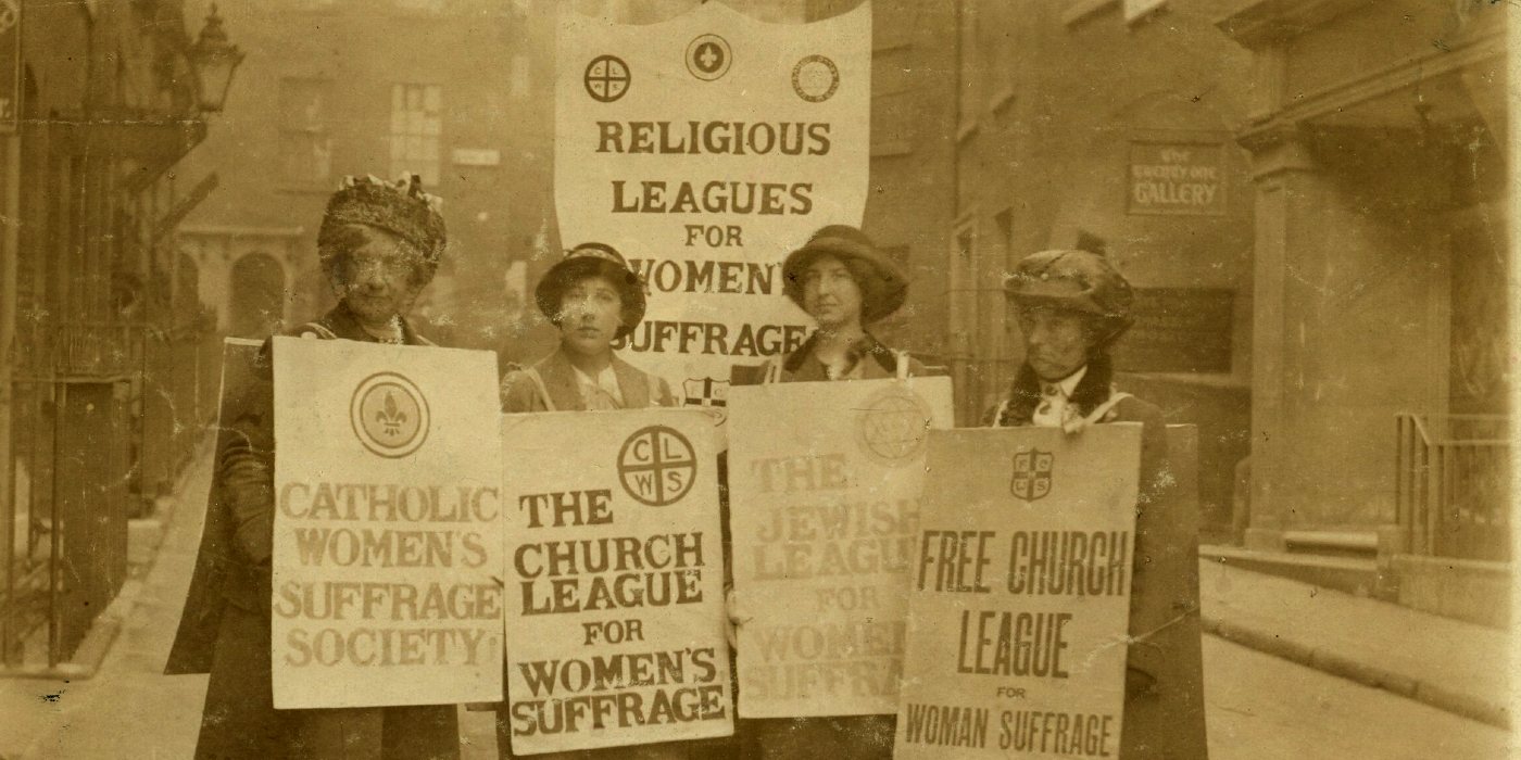 A group of women with placards