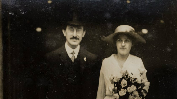 A man and woman portrait on their wedding day.