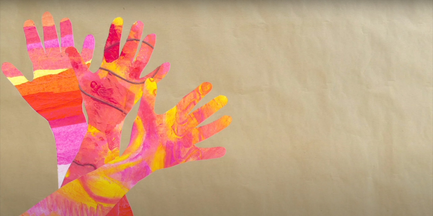 Three hands painted in sunbeams colours of reds, pinks, oranges and yellows set against a light brown background