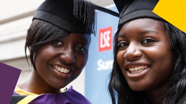 Two smiling LSE students on graduation day
