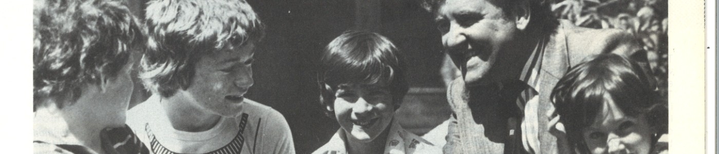 A photograph of Alf Morris MP with children dating to 1978, slightly cropped.