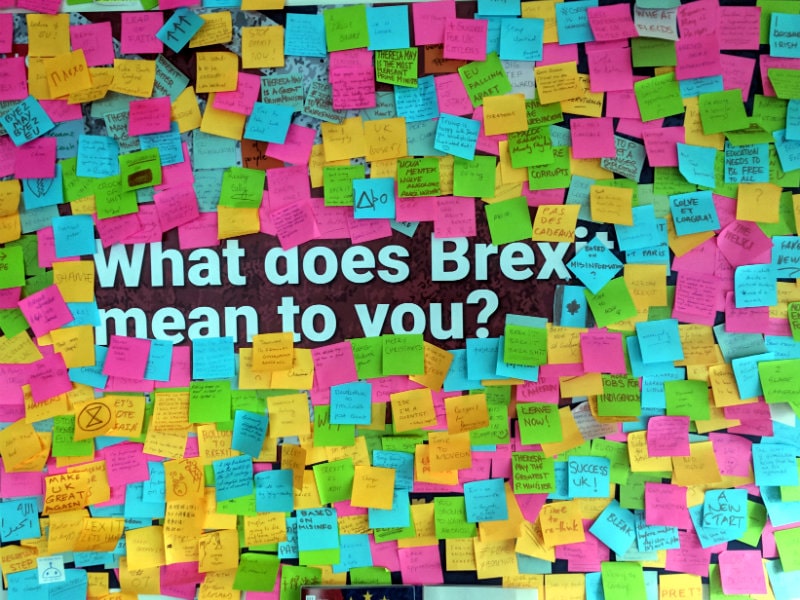 The Brexit wall - a wall of post-it notes where people written responses to the question about what Brexit means to them.