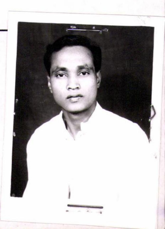 A passport photo of Dinanath Prasad