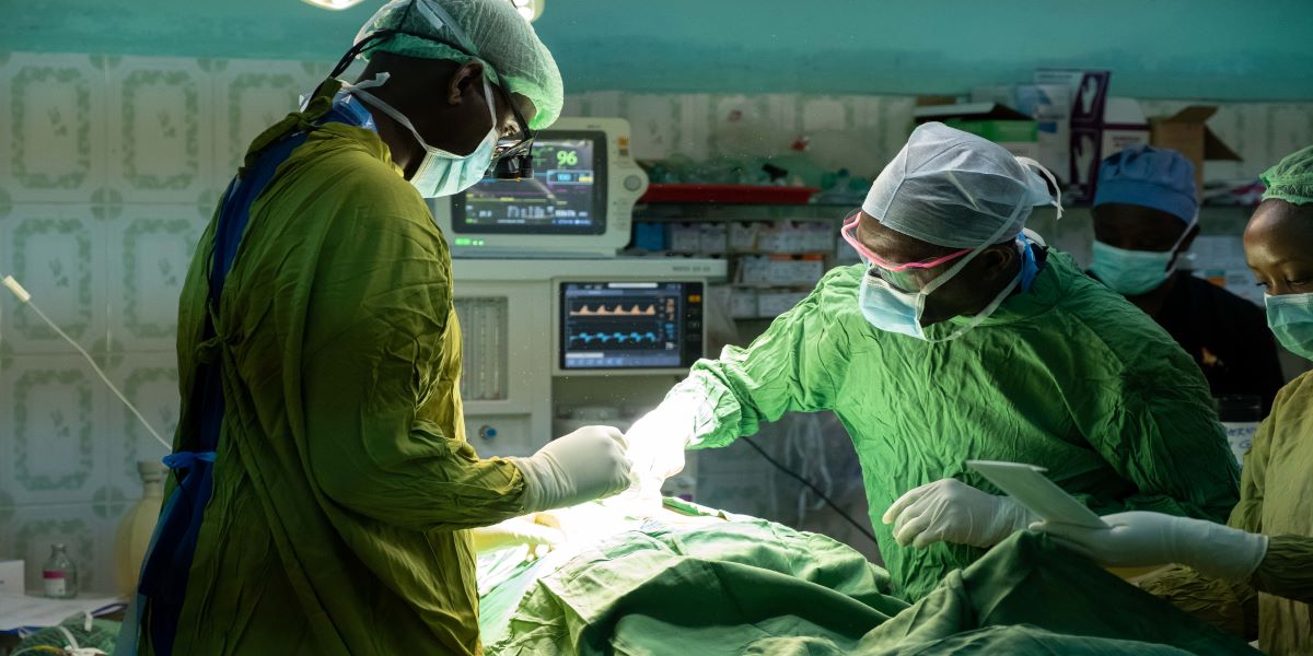 Dr Andrew Nyangau, Consultant Neurosurgeon and his team at Consolata Hospital Mathari in Nyeri, Kenya. Photo Credit:  Vanessa Champion, PhotoAid Global (2019) - Courtesy of RCS England