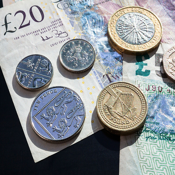 Image of British currency including pound coins