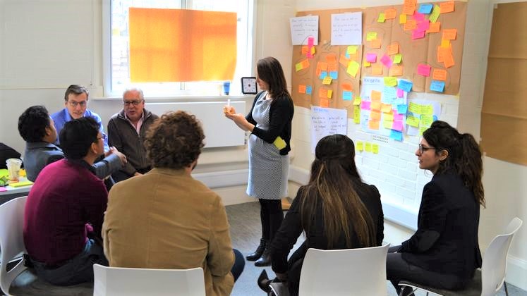 people sitting in Innovation Lab meeting