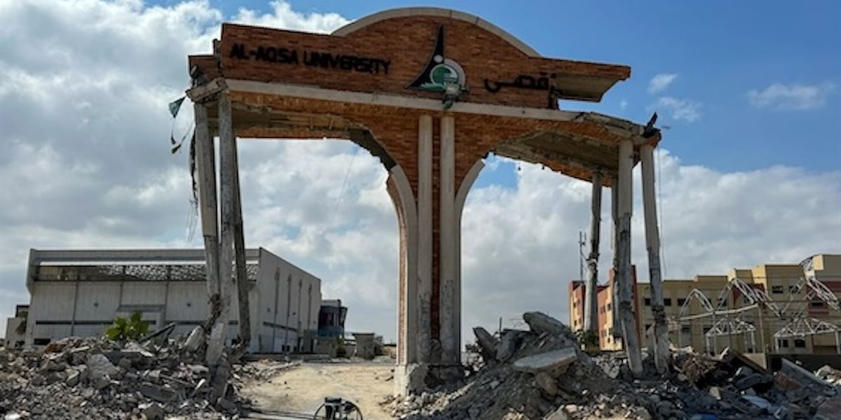 The building remains of Al Aqsa University, surrounded by rubble. 