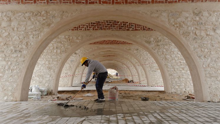  A construction worker at a new market work site in Tunisia.