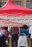 Tent and banner at a protest in Lebanon.