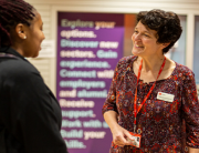 Student talking to member of staff