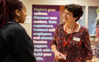 Student talking to member of staff