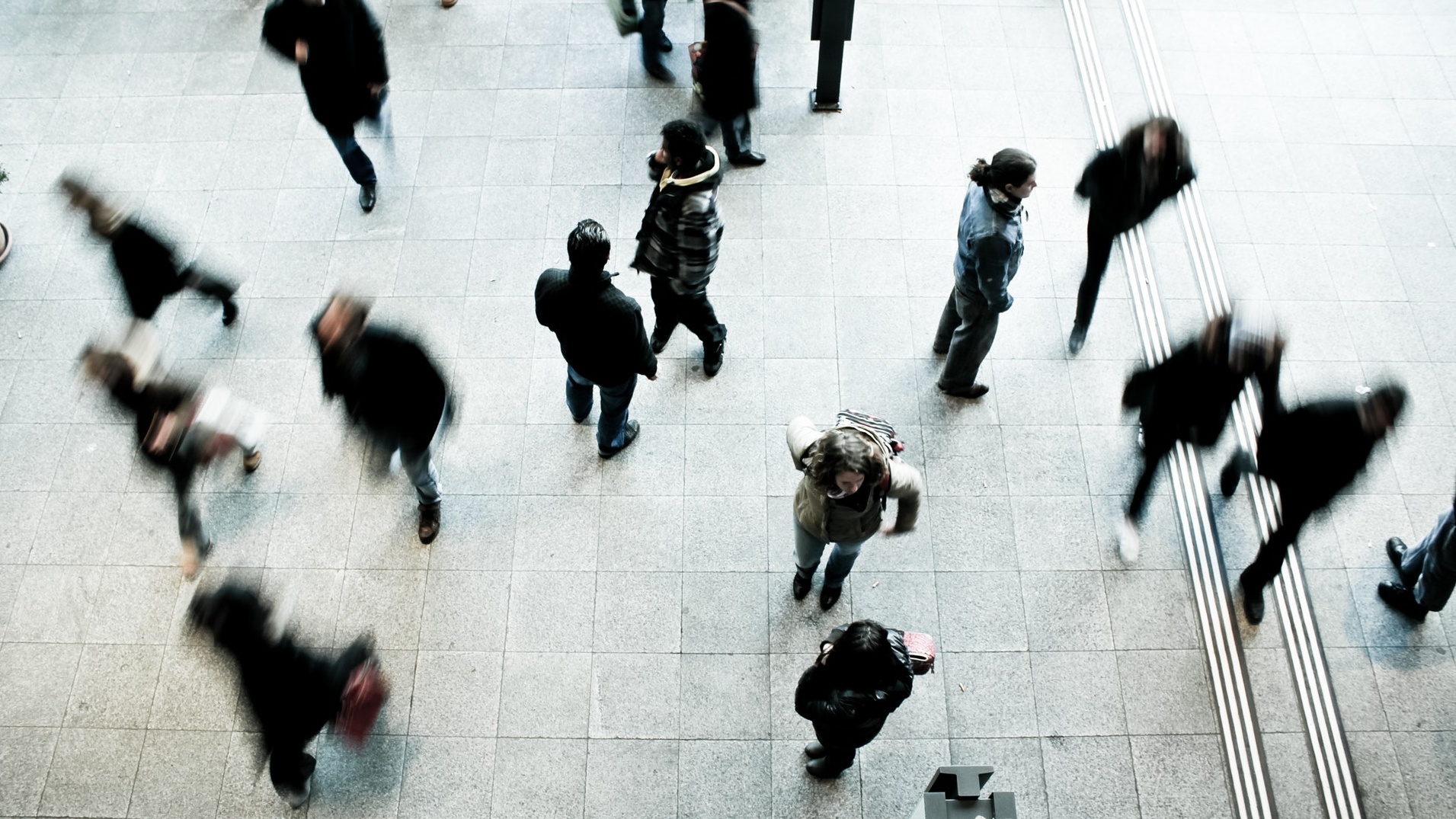 People walking around on a street