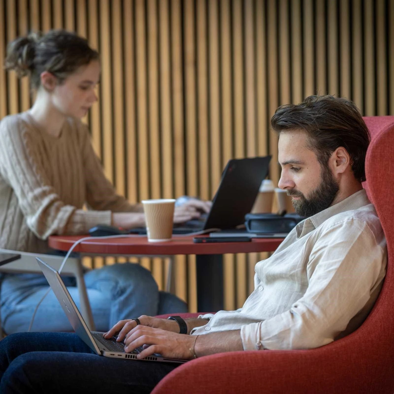 Two students working on laptops