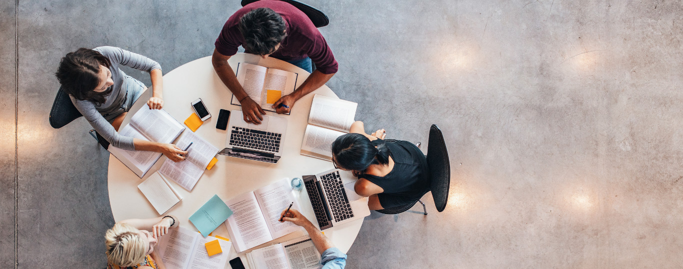 students studying at round table