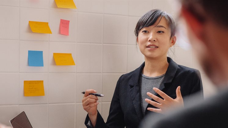 business woman giving presentation