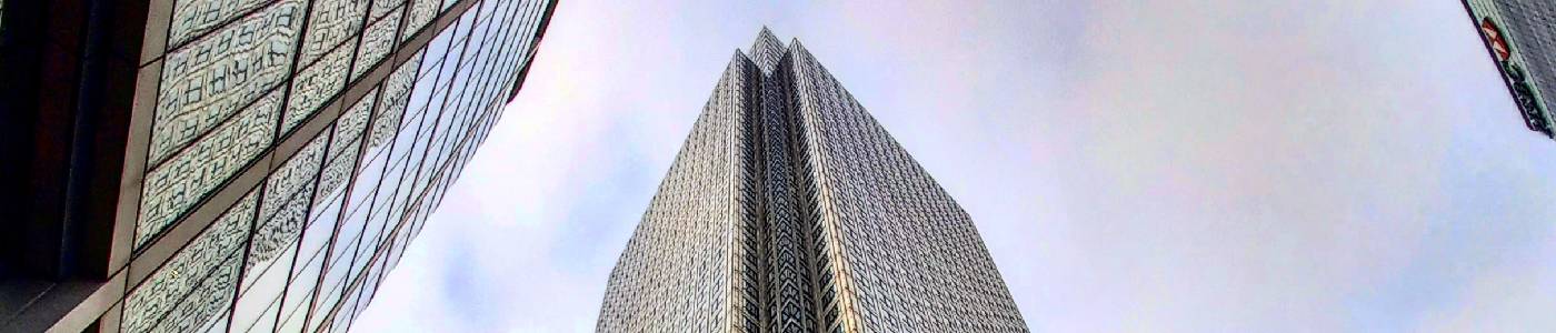 Canary Wharf's tower as seen looking up from street level.