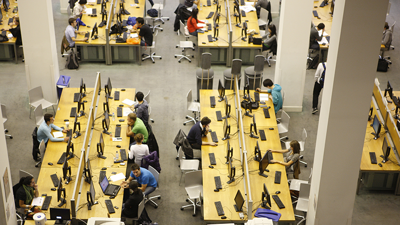 People studying at the LSE library